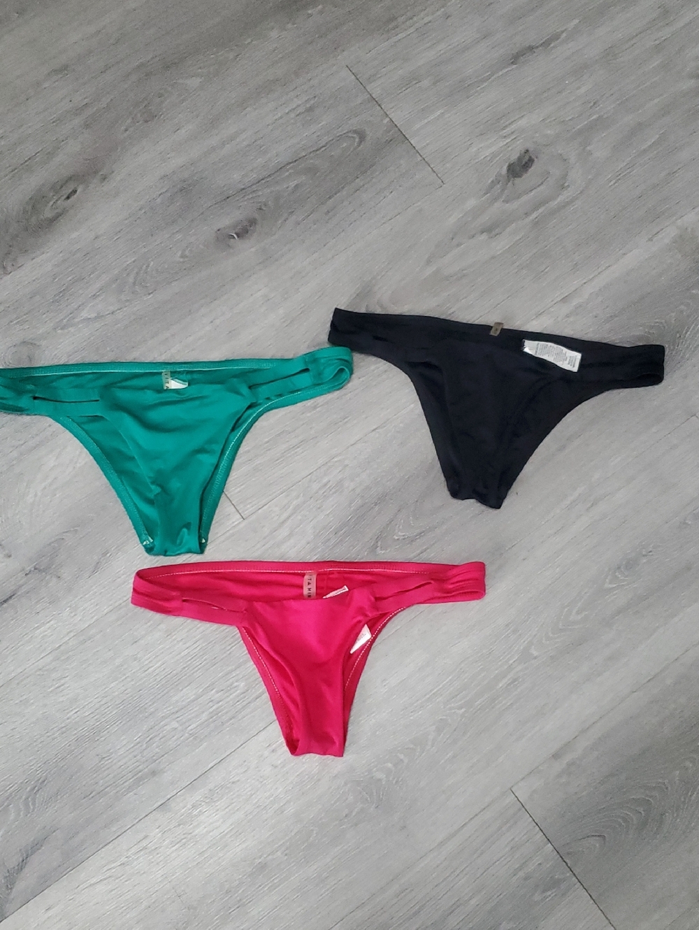 Vitamin A NEUTRA Set of Three Bikini Bottoms in Jade S, Black XS & Hot Pink XS